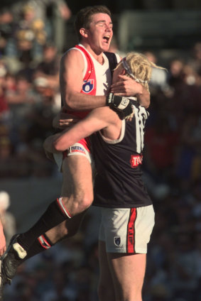 St Kilda players celebrate the win against the West Coast Eagles.