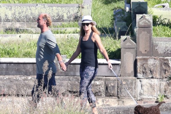 Deborah Hutton and Bondi meditation guru Andrew Marsh walking in May.