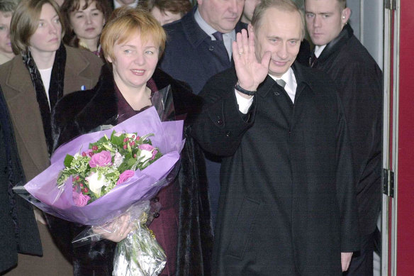 Russian President Vladimir Putin and his then wife Lyudmila arriving in Britain in 2001.
