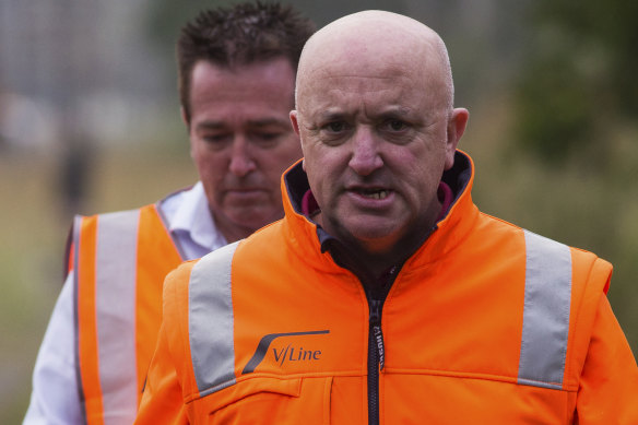 V/Line CEO James Pinder, pictured at the scene of a train derailment in March, has been suspended.