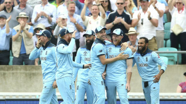 Ben Stokes celebrates his stunning catch with teammates.