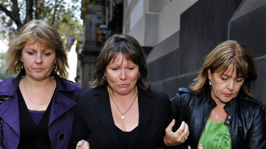 Dawn Waite (centre) is helped by friends leaving court after an emotional afternoon giving evidence.