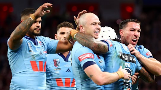 NSW players celebrate.