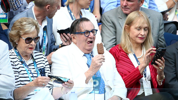 Barry Humphries cools off at the Australian Open Men's Final.