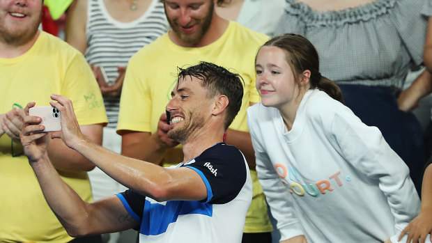 Millman takes a few selfies with fans after his second round win.