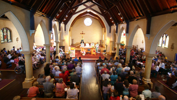 The scene inside St. Joseph's Church, Collingwood, in 1997, when Father Ernie Smith retired.