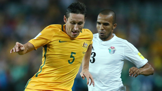 Old foe: Mark Milligan and Jordan's Yaseen Bakheet battle for the ball during their World Cup qualifying match in Sydney in 2016.