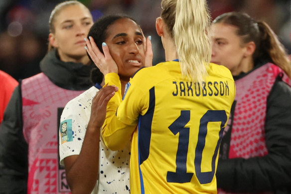 Sweden’s Sofia Jakobsson consoles Naomi Girma of the US.