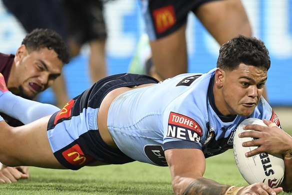 NRL player Latrell Mitchell reported online abuse he has received.