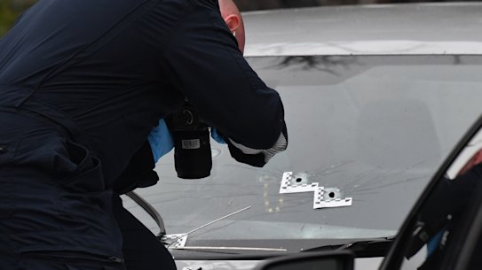 Police at the scene of the shooting outside the Tullamarine McDonald's. 