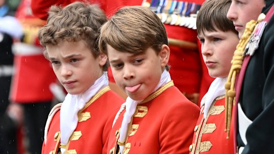Prince George, centre, and other Pages of Honour wait for King Charles III and Camilla, Queen Consort, to arrive at Westminster Abbey.