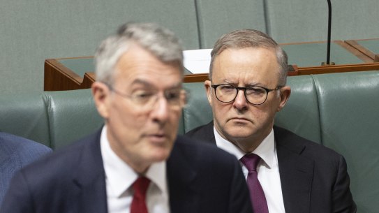 Prime Minister Anthony Albanese watching as Attorney-General Mark Dreyfus introduces Labor’s bill to establish a national anti-corruption commission.