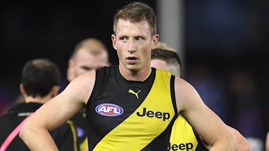 Nervous wait: the loss of defender Dylan Grimes would be a blow as Richmond aim for a top-two finish.