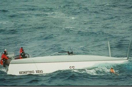 Bullimore emerges as HMAS Adelaide crew knock on the opposite side of the hull. This image was part of a folio that won the West Australian Press Photographer of the Year Awards for Tony McDonough, a Perth freelance photographer sent by Fairfax Media to cover the situation.