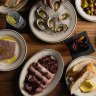 Snacks at Dutch Rules include terrine, charcuterie, oysters and parmigiano reggiano.