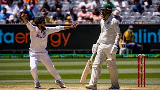 Ravindra Jadeja appeals for LBW against Mitchell Starc on day four at the MCG.