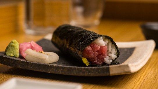 Most hand rolls, including the tuna-filled “torotaku”, are $9.50.