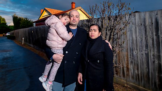 
Chris Cox with wife Myra and daughter Sammy, 3, at their home in Oakleigh on Wednesday.