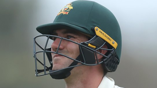 Wry smile: Pat Cummins is dismissed on the final day at Galle.