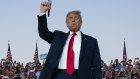President Donald Trump arrives for a campaign rally at Orlando Sanford International Airport on Monday.