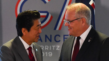 Japan's Prime Minister Shinzo Abe meets with Scott Morrison during the G7 Summit.