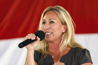 COVID conspiracy theorist Marjorie Taylor Greene speaks at a Republican rally in Georgia. 