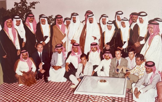 Ross Williamson (second from left front row) and with HRH King Abdullah bin Abdulaziz Al Saud (middle, with hand raised) and various members of the Al Saud family and entourage.