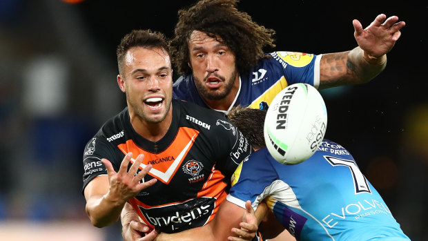 Wests Tigers halfback Luke Brooks tries to find support.