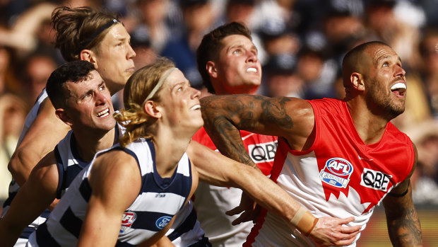 Lance Franklin looks to break free of a rock solid Cats defence.