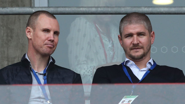 Newcastle Jets coach Carl Robinson, right, with Kenny Miller in the stands watching the Jets last weekend.