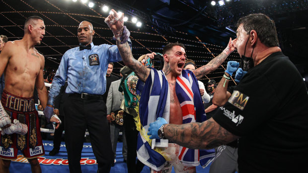 George Kambosos celebrates his win over Teofimo Lopez.