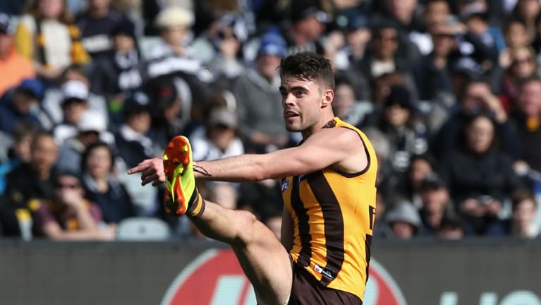 New tack: Conor Nash puts the boot in for Hawthorn.