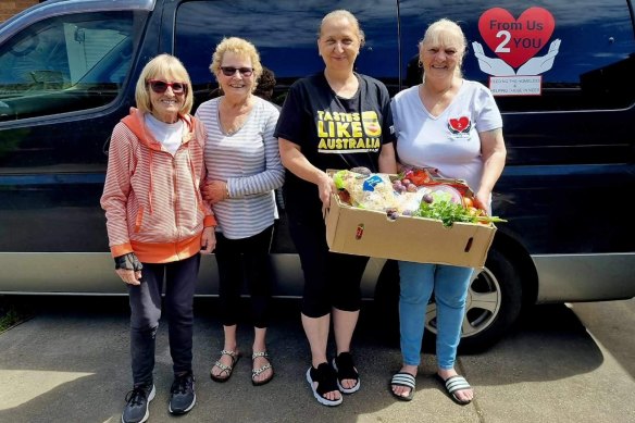 Deborah Henry (far right), founder of From Us 2 You, with volunteers.