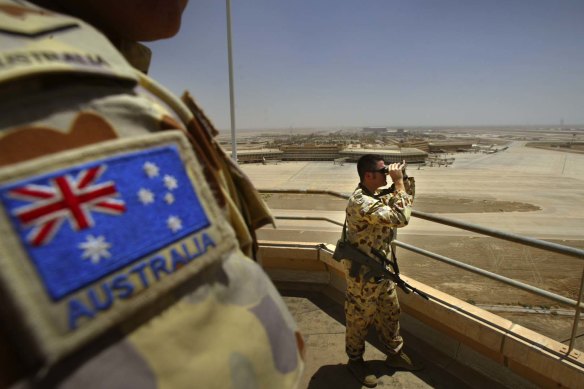 Australian soldiers manning the air traffic control tower in Baghdad, 2003. 