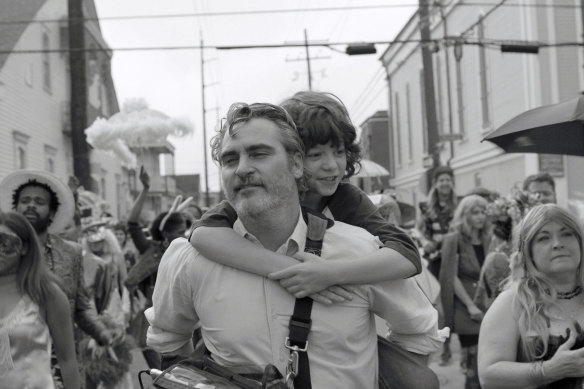 Joaquin Phoenix and his young co-star Woody Norman in <i>C’mon C’mon</i>.