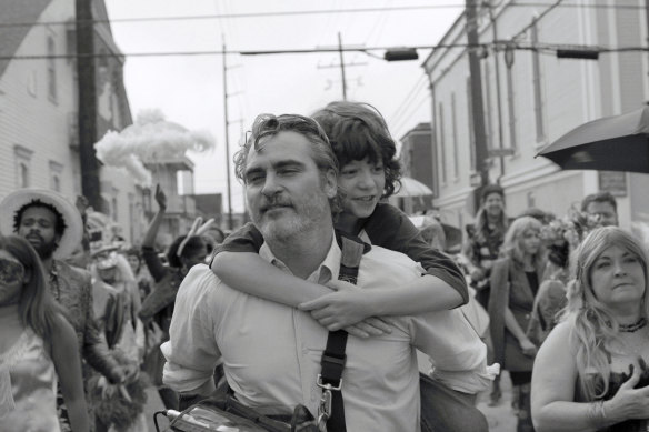 Joaquin Phoenix and his young co-star Woody Norman in C’mon C’mon.