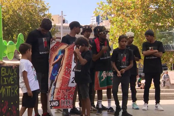 People rally in Perth to protest the death in custody of 16-year-old boy Cleveland Dodd, ahead of the inquest.