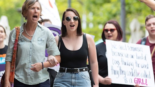 A vocal group marches into Garema Place during the Women's March Canberra on Sunday. 