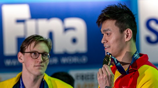 Mack Horton (left) made his point against Sun Yang (centre).