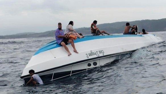 Police released this image of the capsized boat in the waters off Nusa Penida.