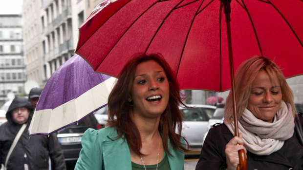 Maroccan model Imane Fadil, left, and an unidentified companion arrive at the Milan court to testify in April 2012. Her death two weeks ago is under investigation.