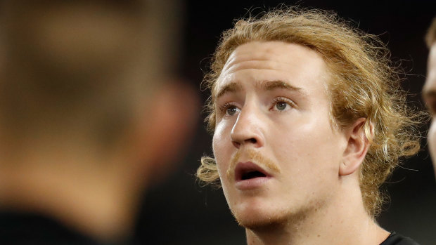 Beau McCreery looks on during Collingwood’s clash with the Brisbane Lions on Thursday.