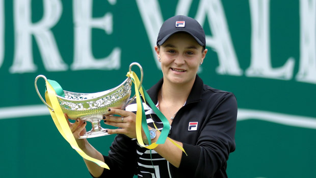 New No.1: Ash Barty with the Birmingham trophy.