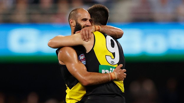 Bachar Houli and Trent Cotchin, his friend and captain, celebrate the 2020 grand final victory.