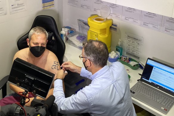 Victoria’s Chief Health Officer Brett Sutton gets his flu jab on Friday.