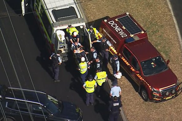 The female constable was stretchered to a waiting ambulance after being freed from the vehicle.