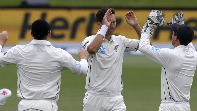 Quick-fire: Trent Boult (centre) is congratulated by teammates after quickly securing New Zealand's victory on day five.