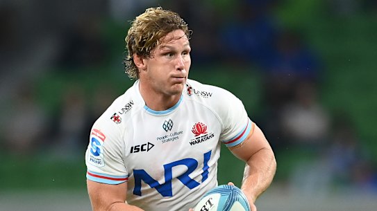 WELLINGTON, NEW ZEALAND - MARCH 17: Jordie Barrett of the Hurricanes is tackled by Michael Hooper and Charlie Gamble of the Waratahs during the round four Super Rugby Pacific match between Hurricanes and NSW Waratahs at Sky Stadium, on March 17, 2023, in Wellington, New Zealand. (Photo by Hagen Hopkins/Getty Images)
