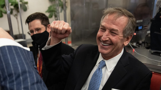 Michael van der Veen, defence attorney for Donald Trump, fist bumps at the US Capitol on Saturday after the impeachment trial ended in a not guilty verdict.