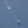 People’s Liberation Army-Navy Renhai-class cruiser Zunyi, and Fuchi-class replenishment vessel Weishanhu in the Tasman Sea.